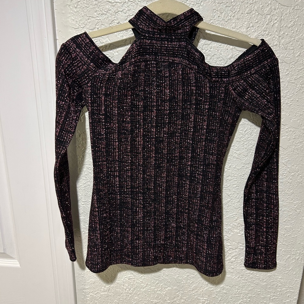 NWT. BCBGMaxAzria women’s size XS long sleeve turtleneck with cold shoulder.